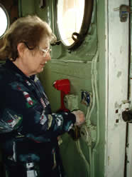 Ruth Ann polishing brass.
