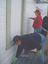 Volunteers painting light.